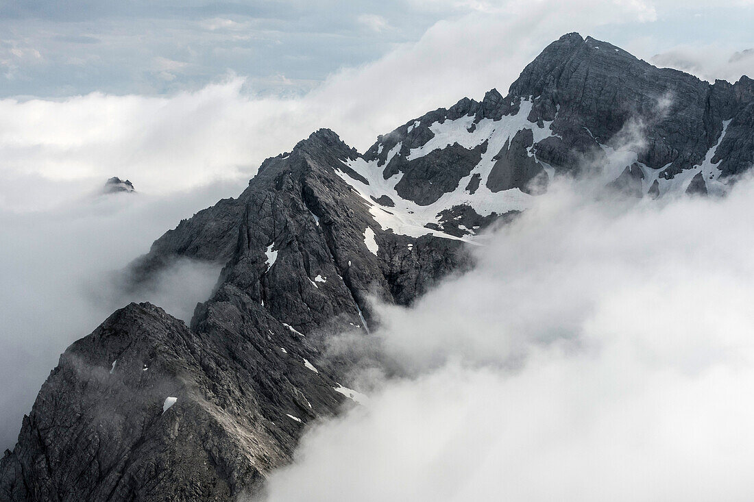 The Hocheisspitze in the fog, Berchtesgaden Alps, Bavaria, Germany