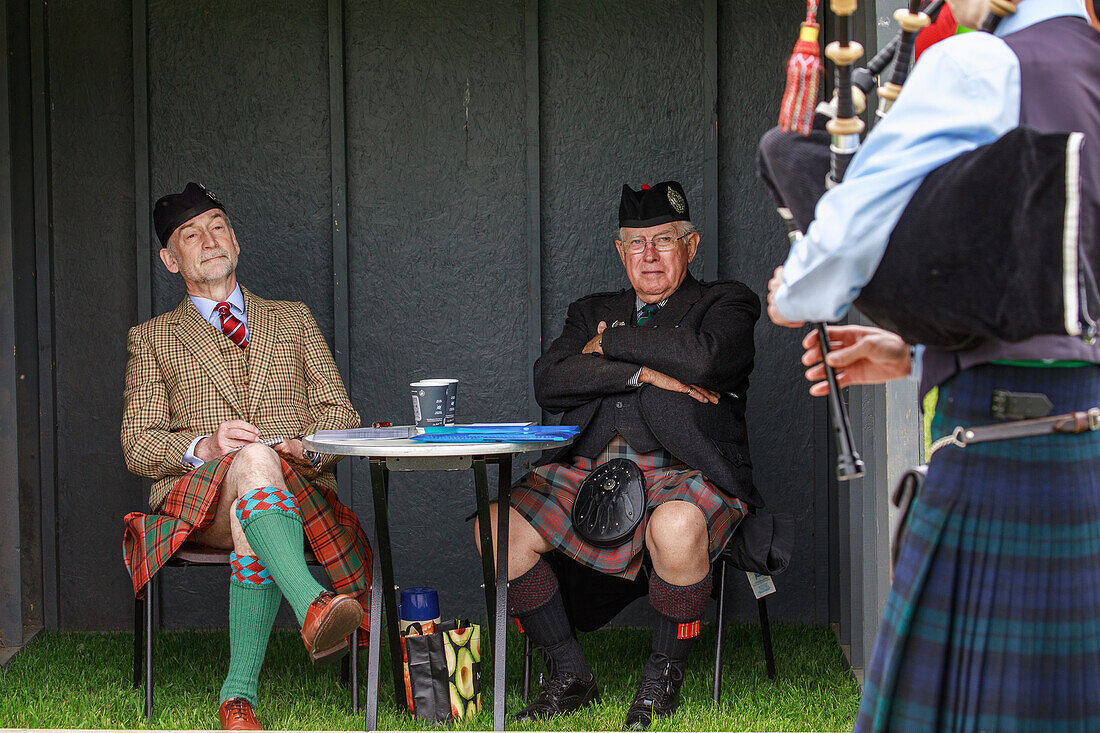 Judges listening to bagpipers, Highland Games, Blair Castle, Perthshire, Scotland, UK