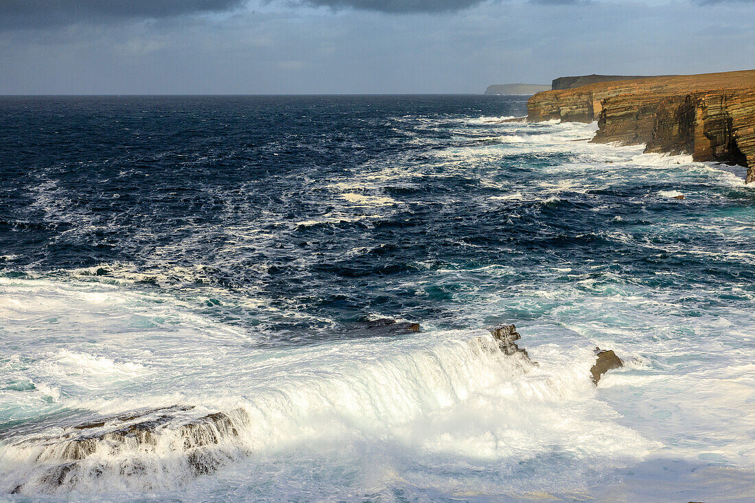 Cliffs and surf breakers on the coast of Yesnaby, Atlantic Ocean, Orkney, Scotland UK