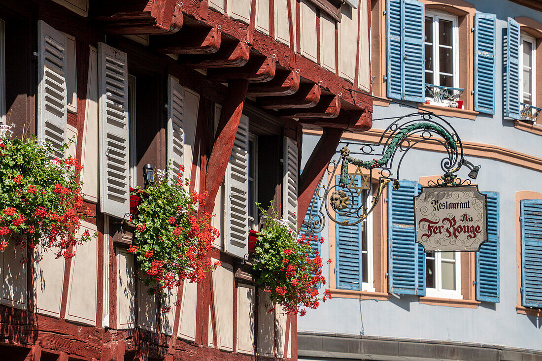 Half-timbered houses in Little Venice, sign Restaurant Fer Rouge, Colmar, Alsace, France, Europe