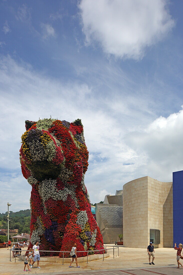 Flower puppy in front of the Guggenheim Museum by Frank O. Gehry, Bilbao, Basque Country, Spain