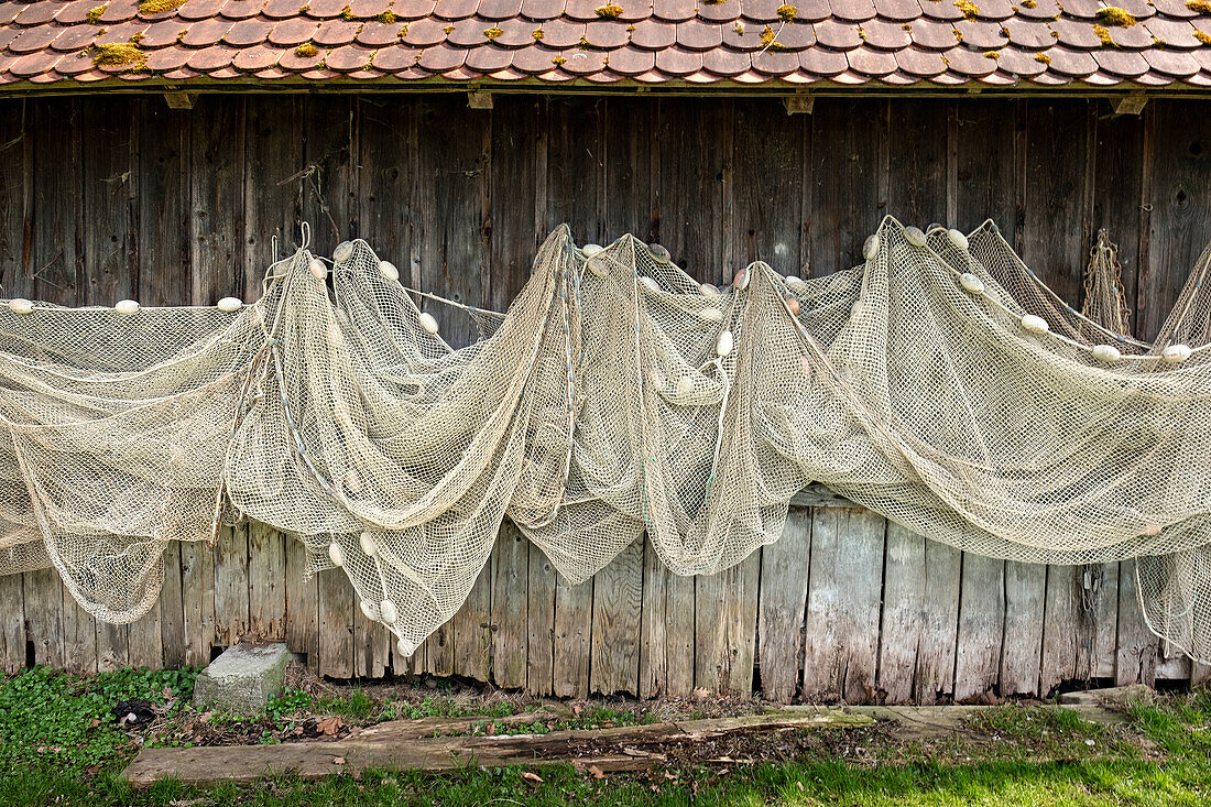 Fishing nets hanging on a wooden hut, Dießen, Diessen, Ammersee, Bavaria, Bayern, Deutschland, Germany, Europe