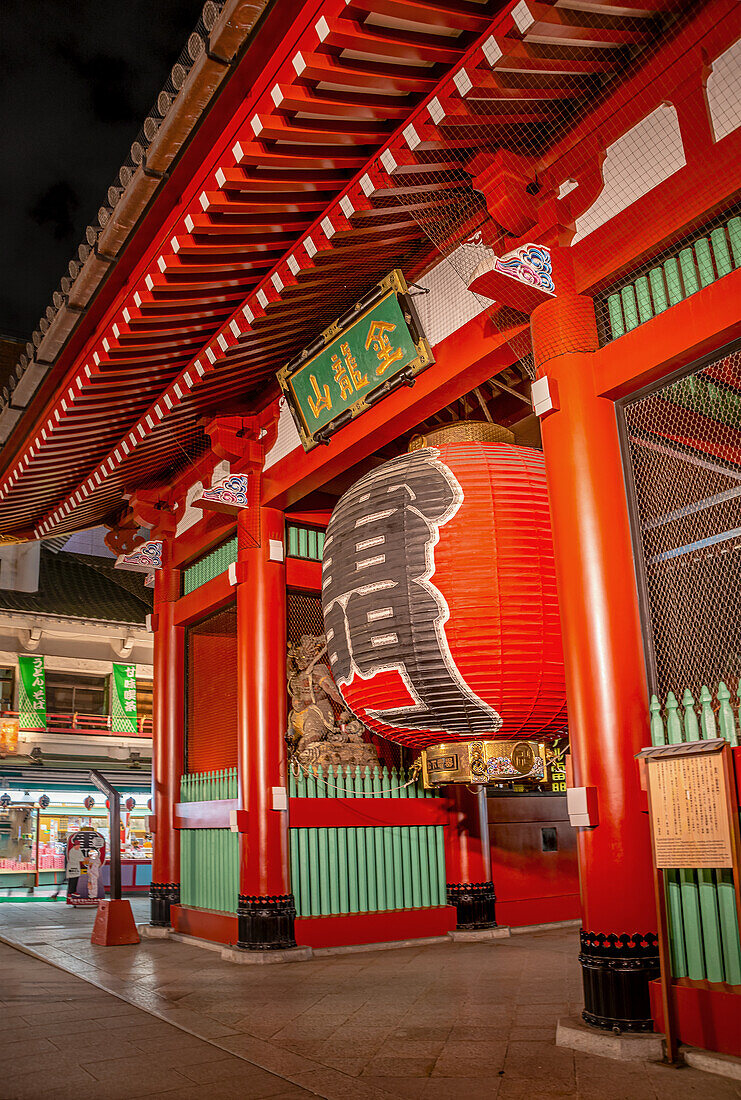 Traditional Edo period red paper lantern at the Kaminarimon Gate (Thunder Gate) at the entrance of Asakusa Shrine (Asakusa jinja), Asakusa, Tokyo, Japan