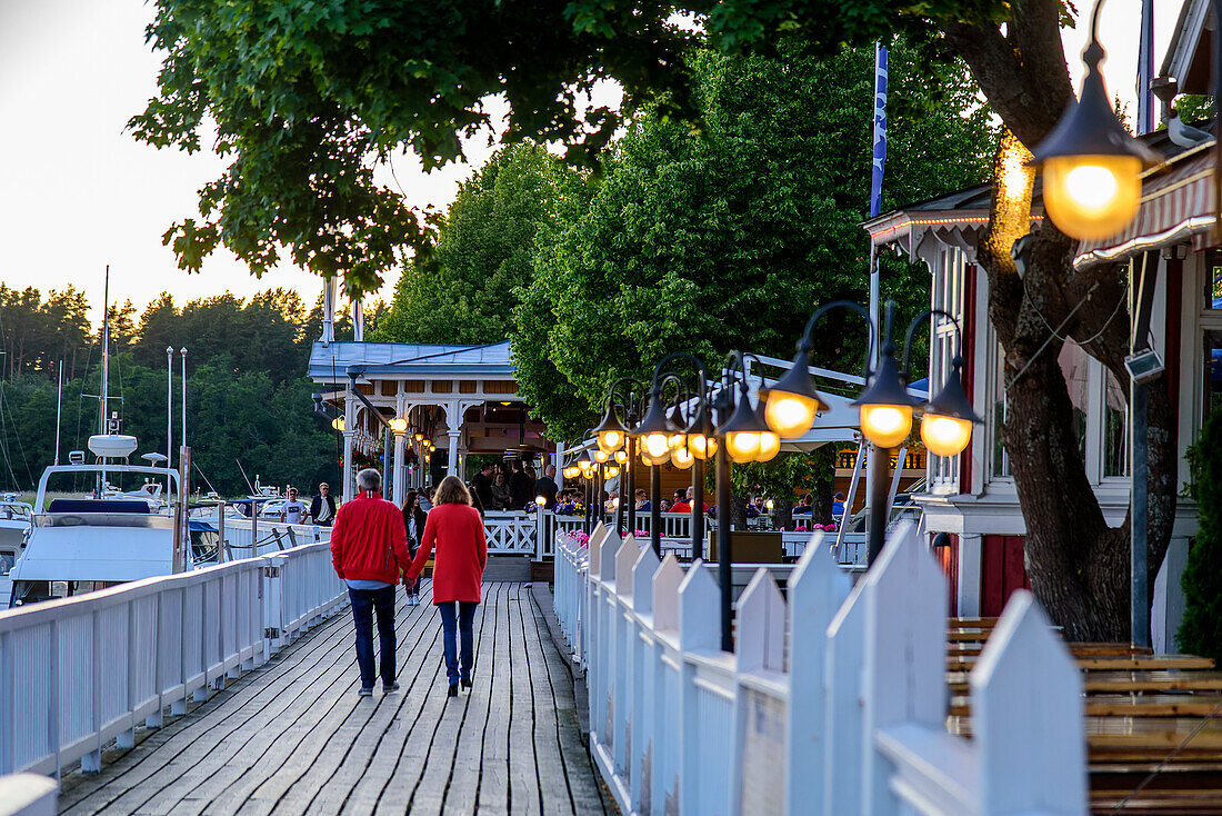 Strollers at the harbor, Naantali old town, Finland