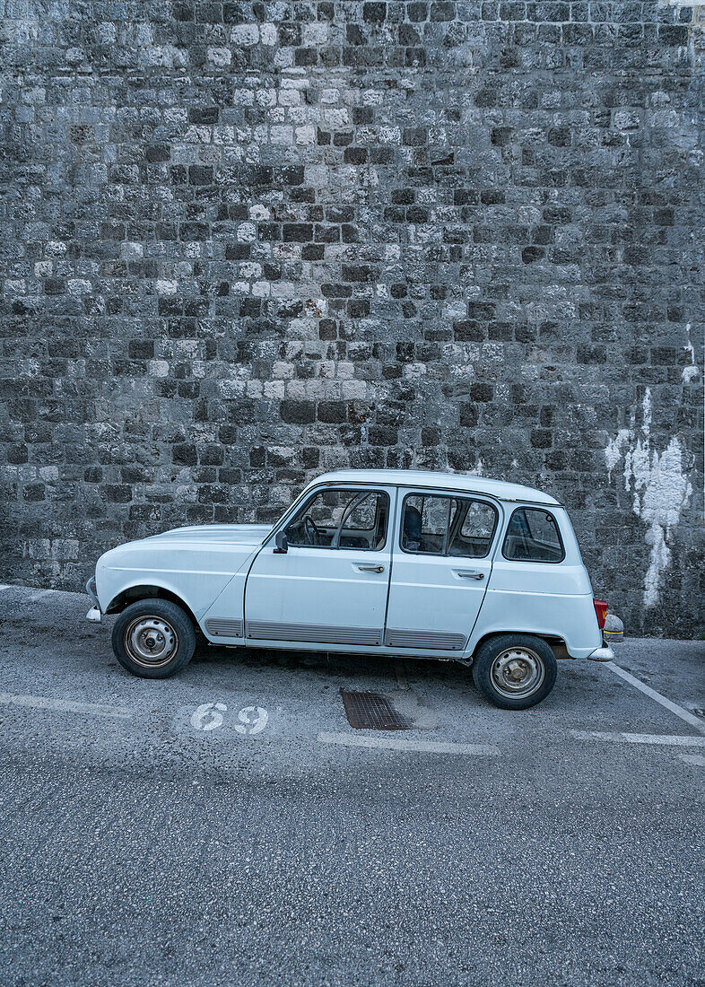 Old car outside the city walls of the old town of Dubrovnik, Dalmatia, Croatia.