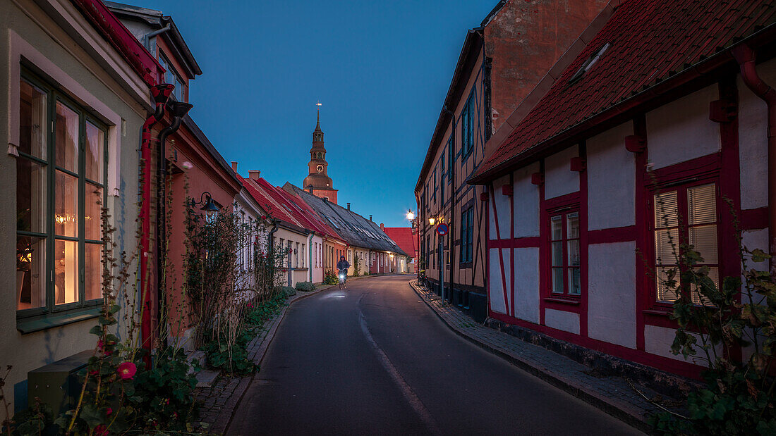 Street with Sankt Marien church in Ystad in Sweden at night