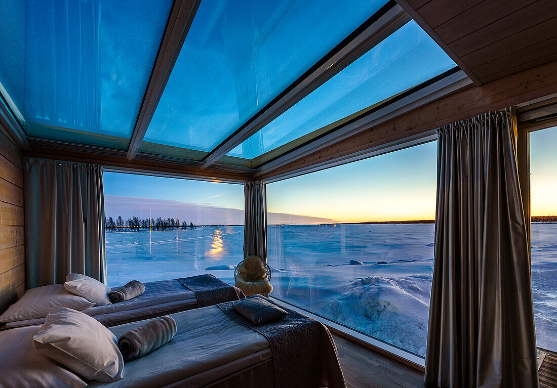 Seaside Glass Villas accommodation next to the Lumilinna Snow Hotel in Kemi, Finland