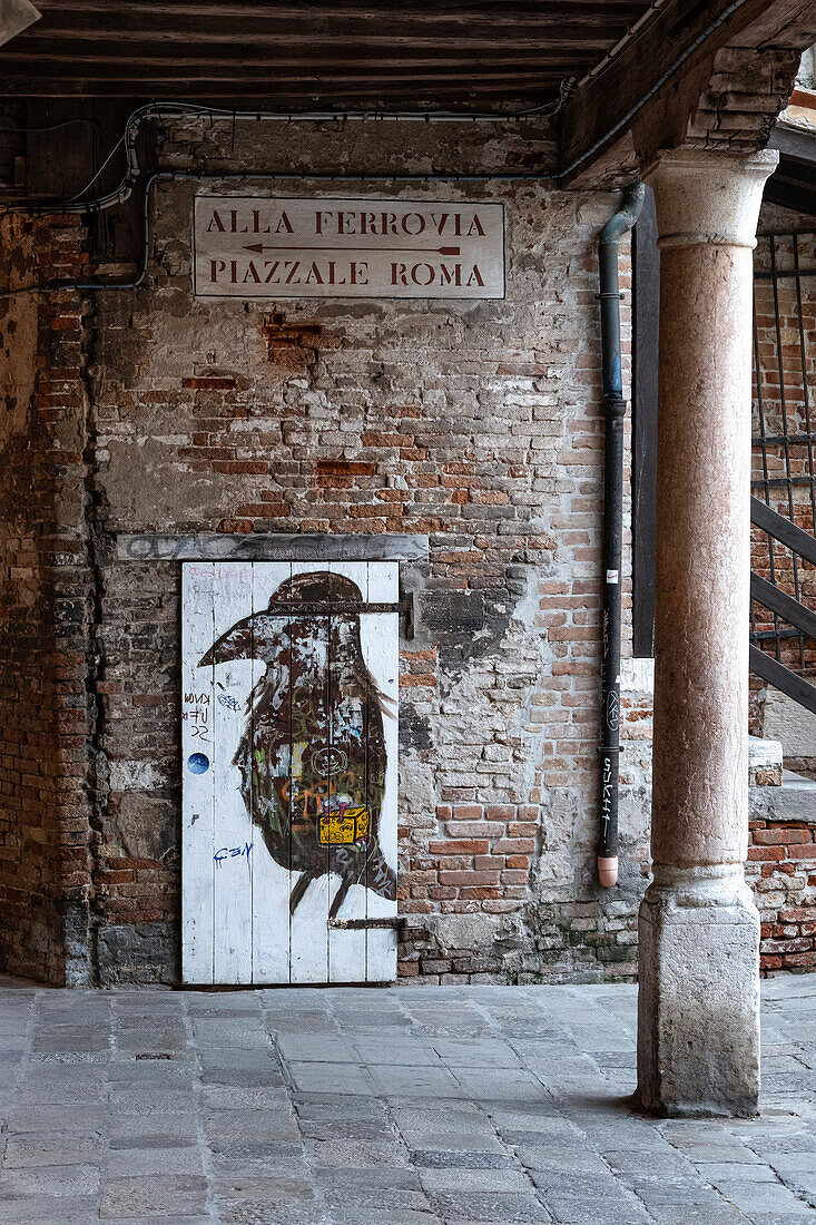 Street art on a door in Venice, Veneto, Adriatic Sea, Italy, Europe