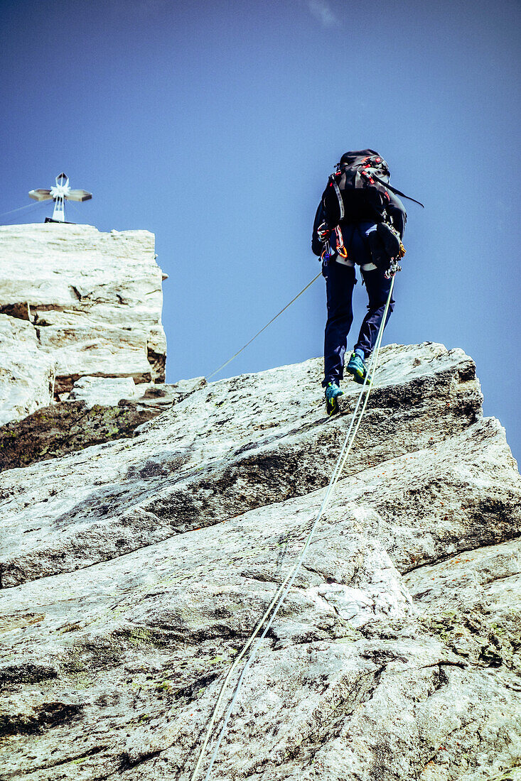 Climbers abseiling from the Zsigmondyspitze in the Zillertal Alps - alpine climbing route