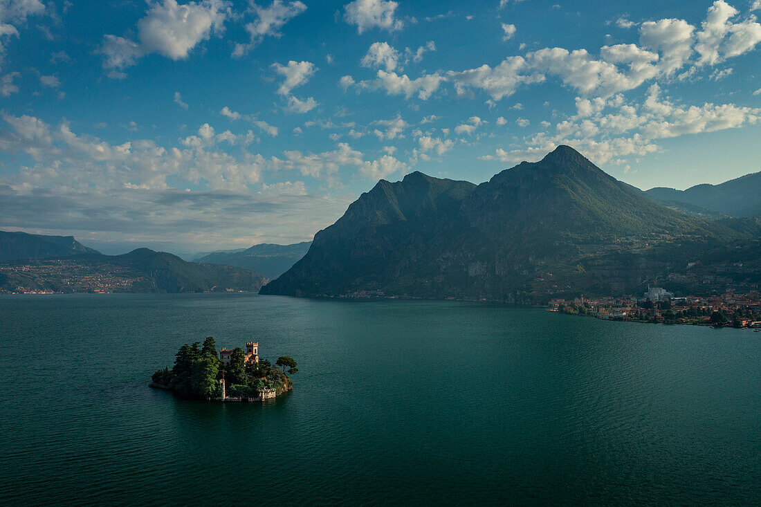 Castle Castello della Isola di Loreto on island in Lake Iseo from above, Italy