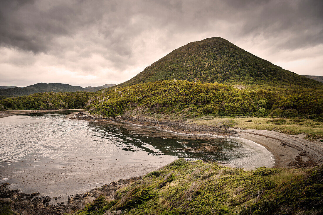 Bay at the San Isidro Lighthouse, Fin de Camino (last stretch of road from the mainland), south of Punta Arenas, Patagonia, Chile, South America