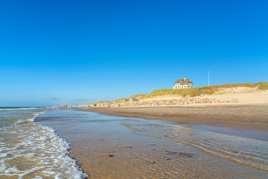 Cottages on the beach at Løkken, North Jutland, Jutland, Denmark