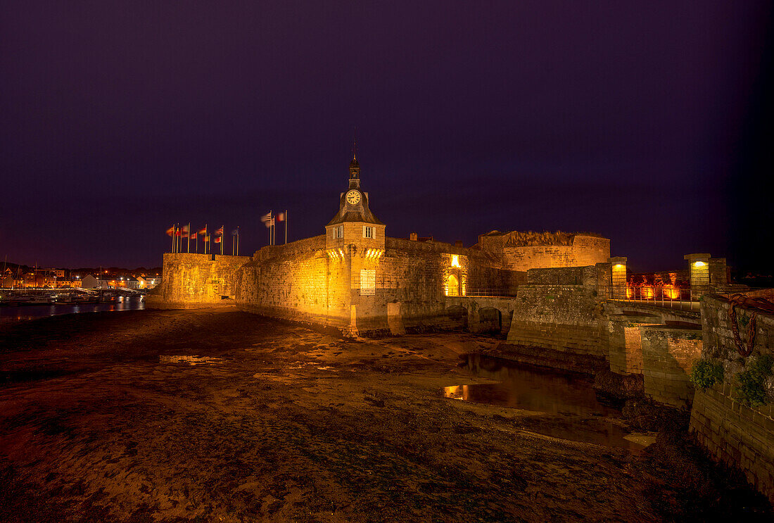 The Ville Close of Concarneau at night at low tide, Brittany, France