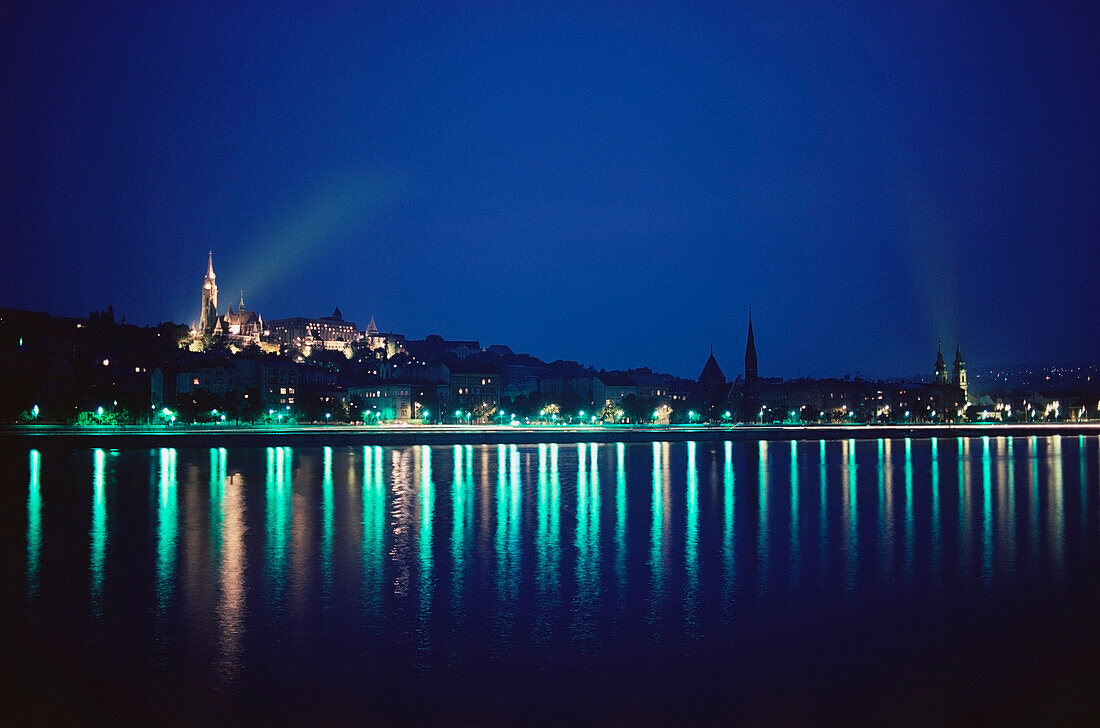 City lit up at night, Danube River, Fisherman's Bastion, Church Of St. Anne, Budapest, Hungary