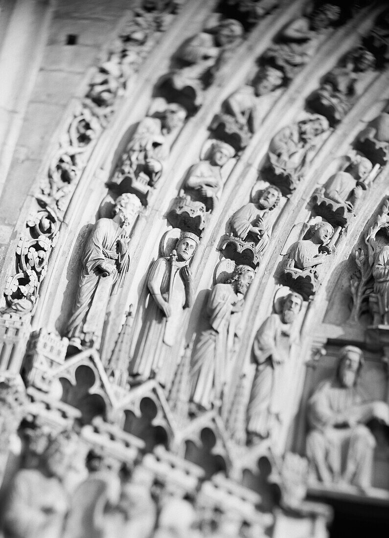 Detail of stone carvings of figures in a museum, Musee d'Orsay, Paris, Ile-de-France, France