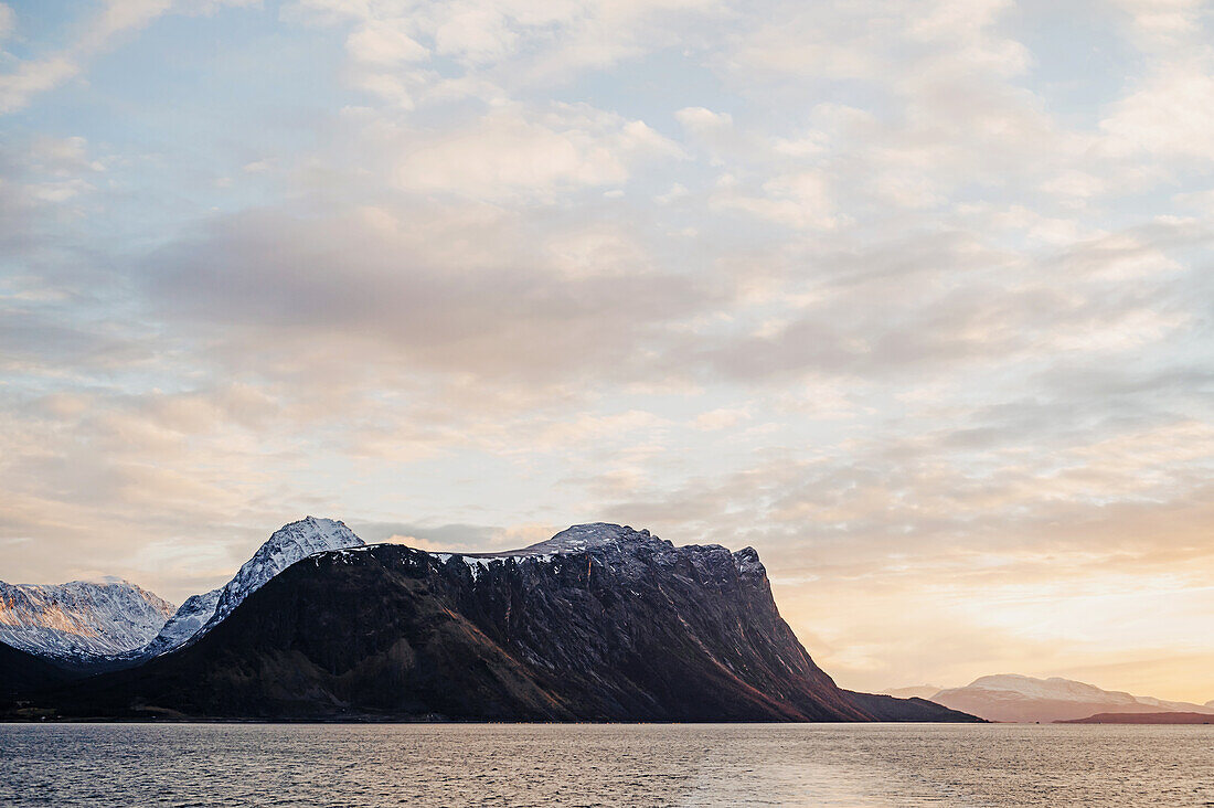 Rocks in the sea in the morning at Risoyhamn, Nordland, Norway, Europe