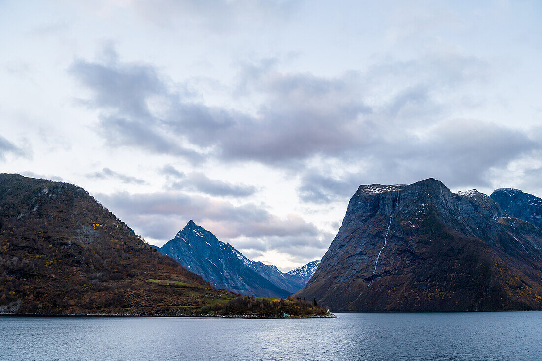 View of the mountain formations at the blue hour in the Hjoerundfjord, Moere and Romsdal, Hurtigrute, Norway, Europe,