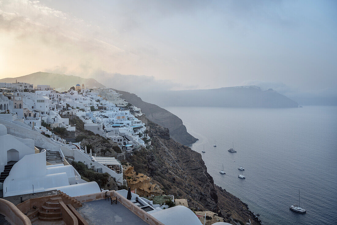 Blue dome of the Greek Orthodox Church, view of caldera, Oia, Santorini, Santorin, Cyclades, Aegean Sea, Mediterranean Sea, Greece, Europe