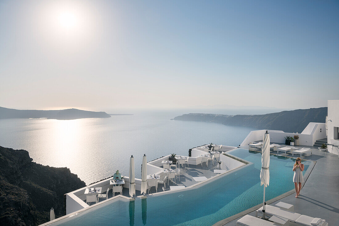 Hotel pool with view from Fira to the caldera of Santorini, Santorin, Cyclades, Aegean Sea, Mediterranean Sea, Greece, Europe
