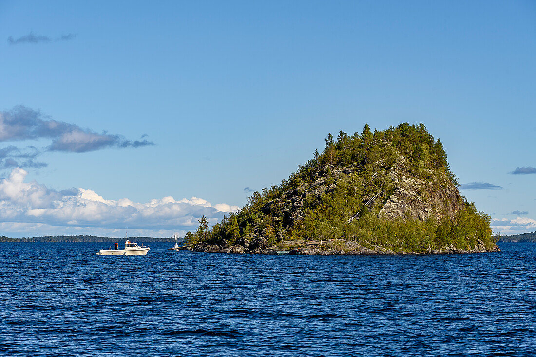 Boat tour to Ukonkivi – Sacred Island of the Sami in Lake Inari, Inari, Finland