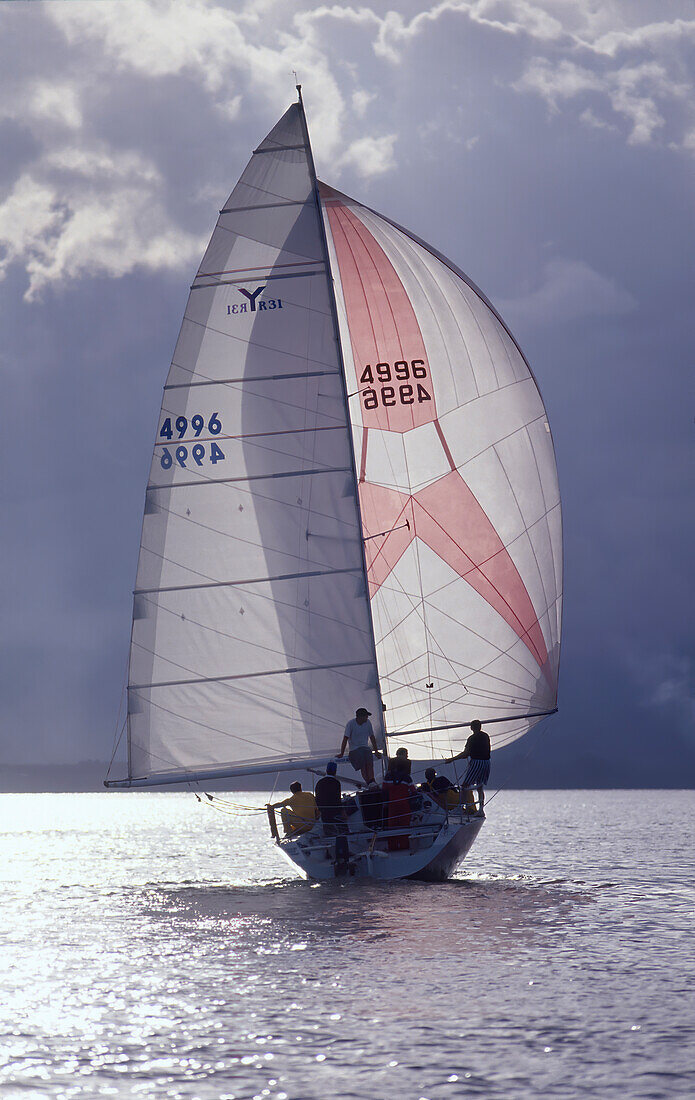 Yacht in full sail on stormy day