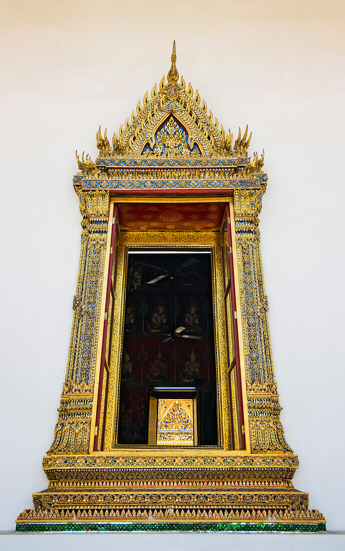 Ornate window of Buddhist Temple in Bangkok