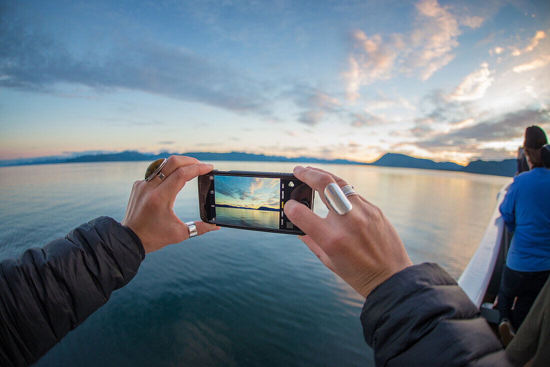 Taking photo of sunset with phone