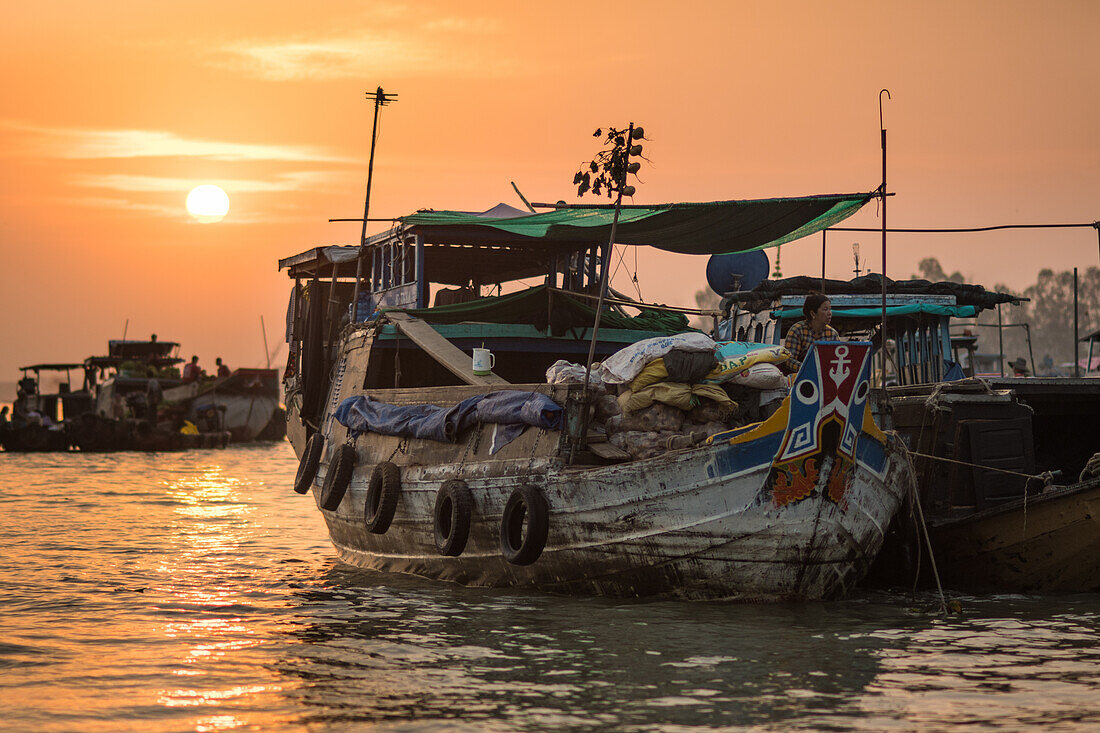 Vietnamese trade boat at sunrise