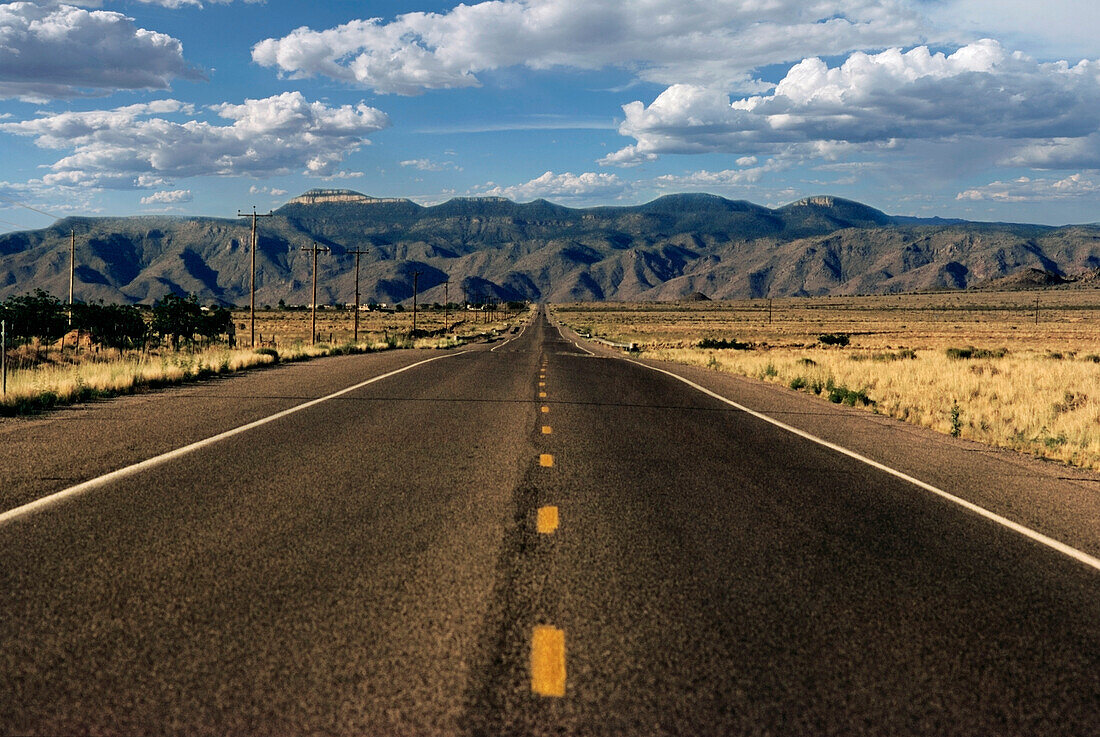 Highway leading to mountain range, Historic Route 66, Arizona, USA