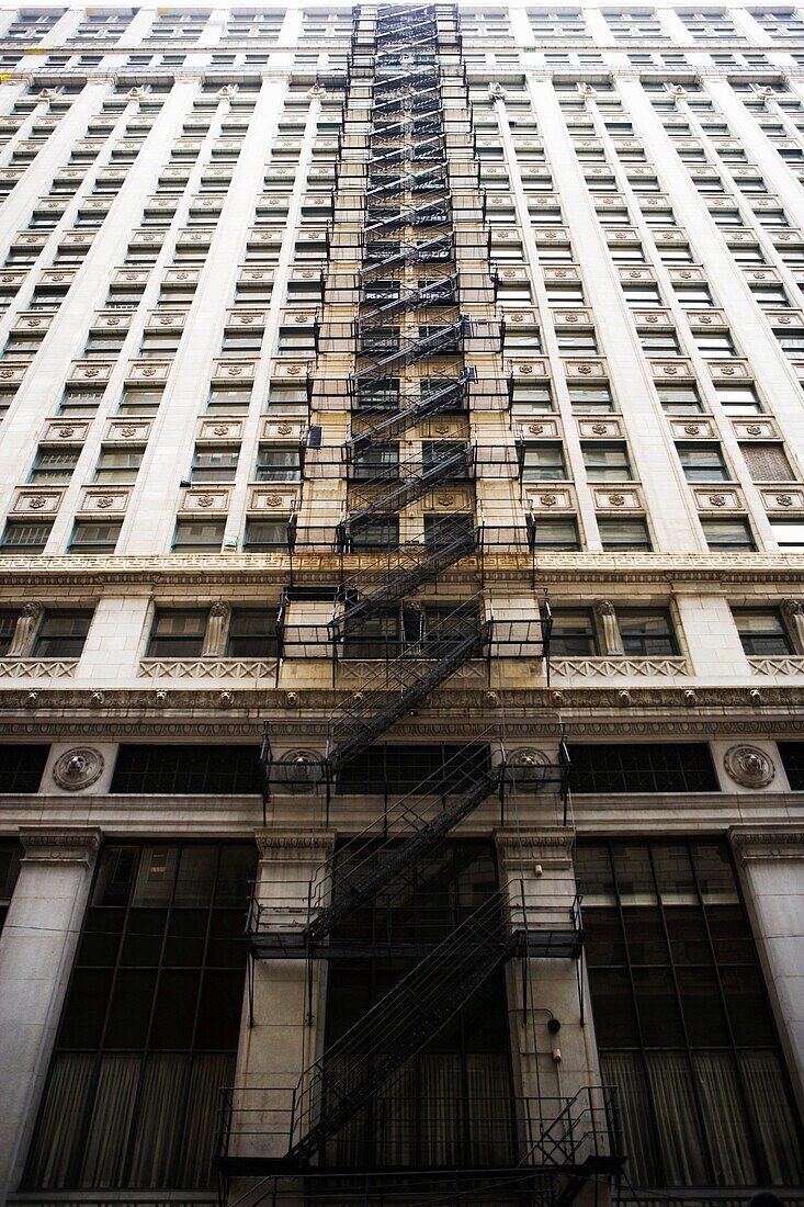 Low angle view of fire escapes outside a building, New York City, New York State, USA