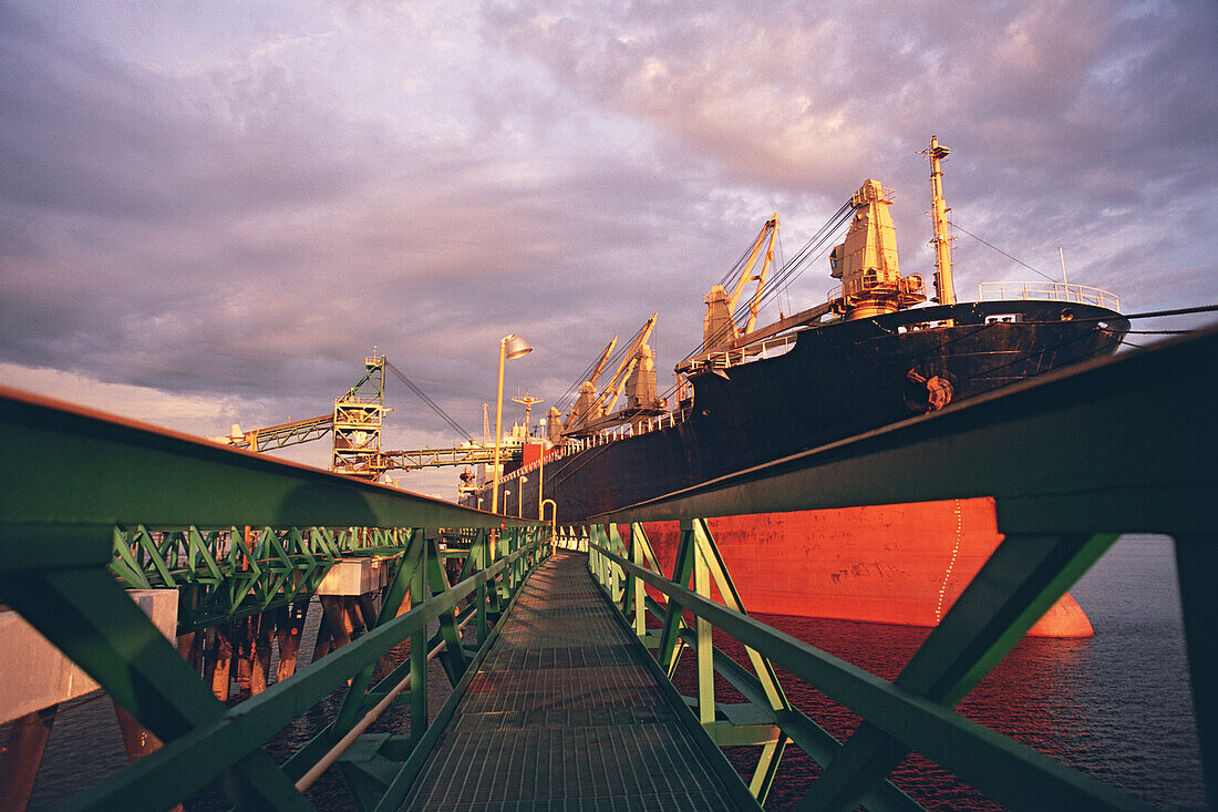 Gangway near large ship moored in port