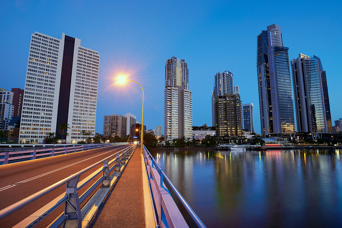 Looking across the Chevron Bridge leading towards Surfers paradise and high rise apartments in early evening