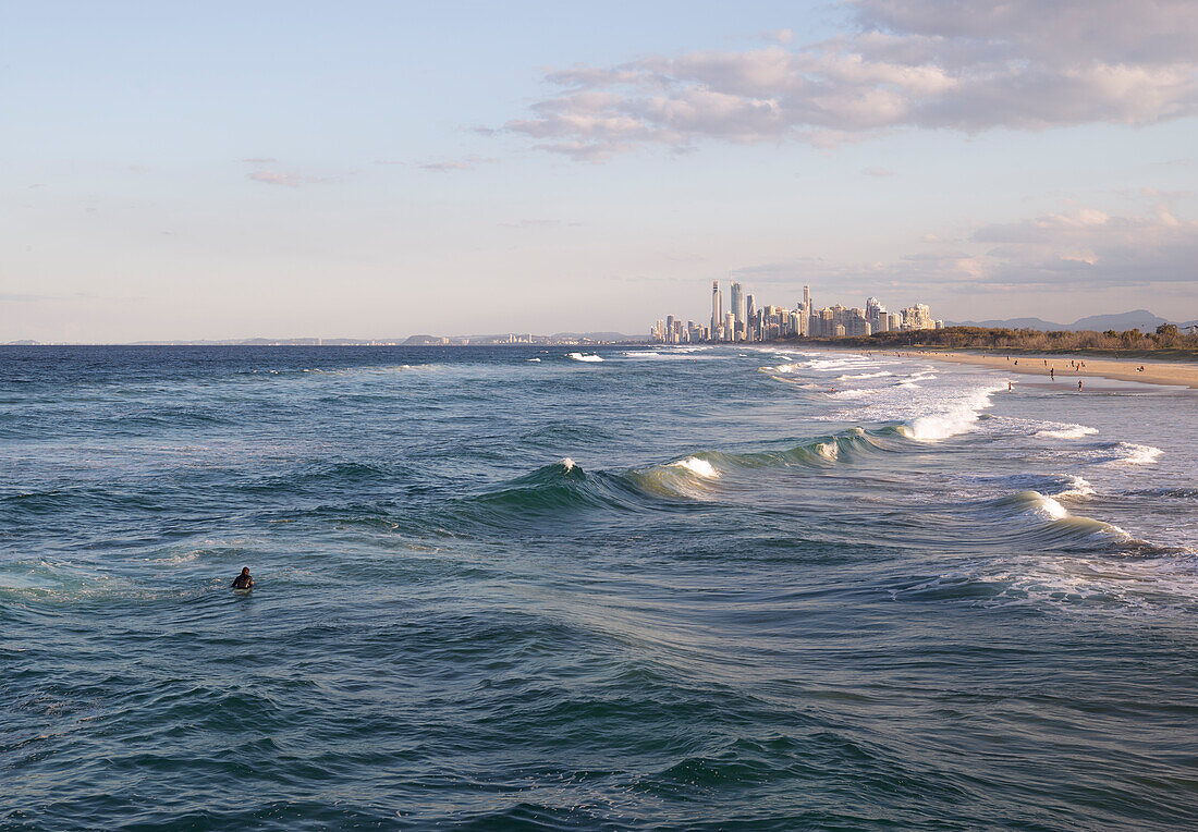 Surfer in the water at Surfers Paradise - Gold Coast