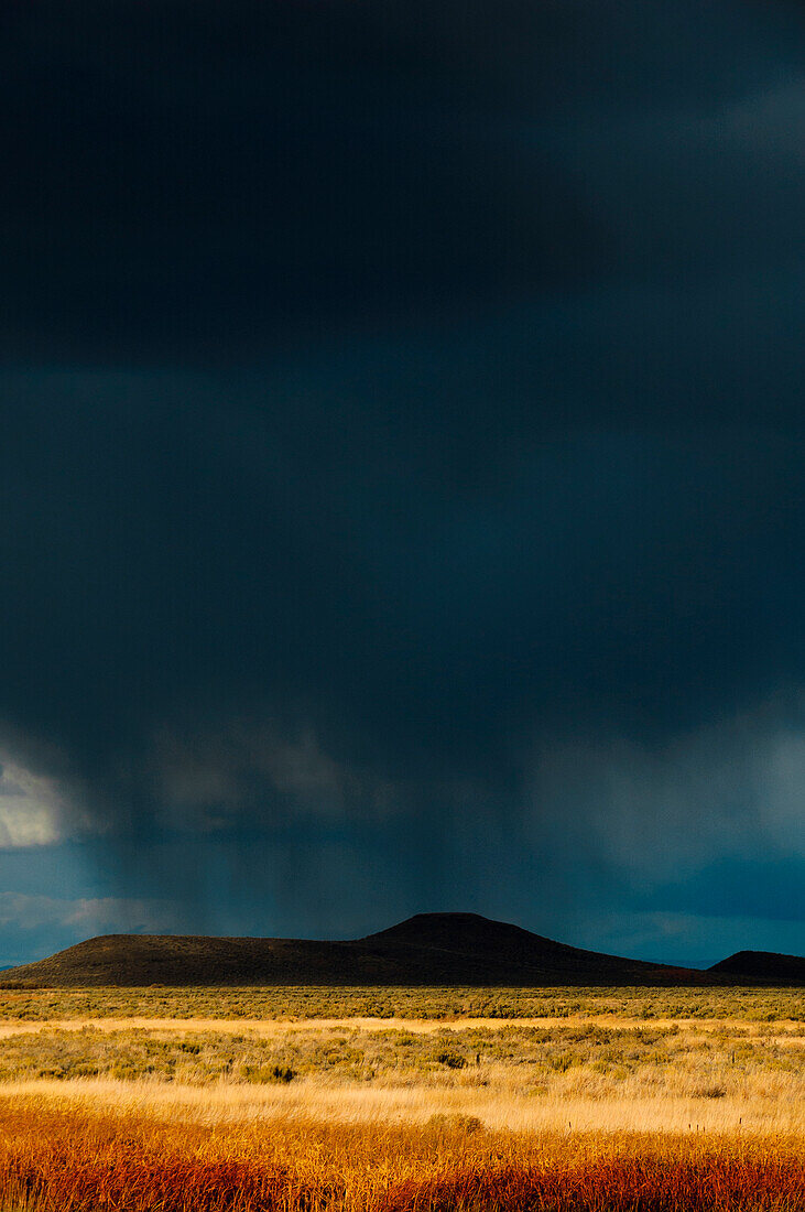 A storm dumps rain at Malheur National Wildlife Refuge in eastern Oregon