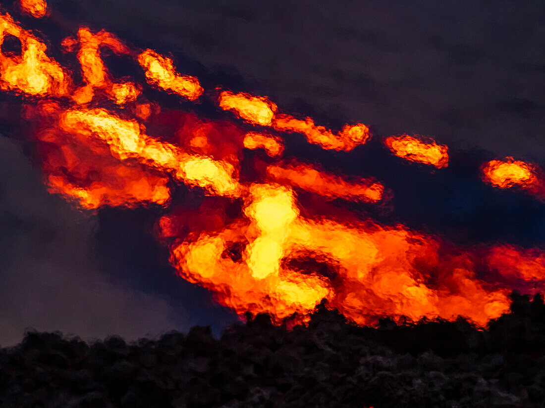 Heat waves from glowing river of lava from Fagradalsfjall volcanic eruption at Geldingadalir, Iceland