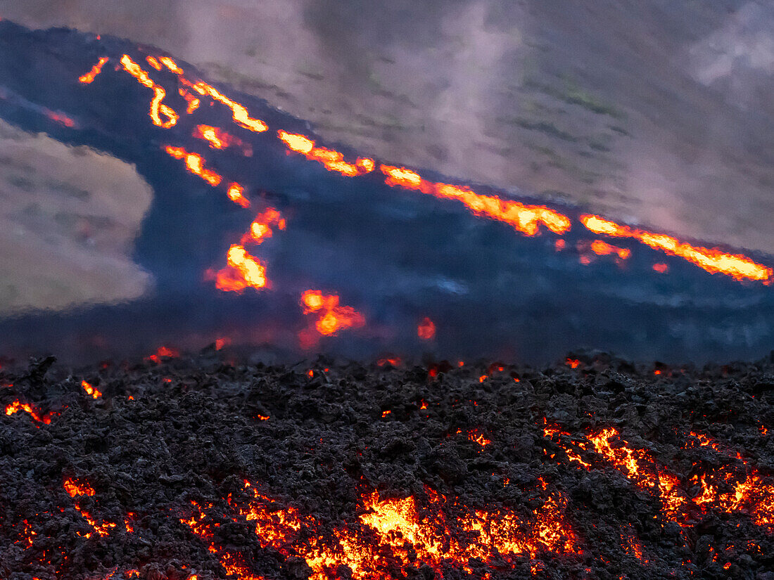 Glowing river of lava from Fagradalsfjall volcanic eruption at Geldingadalir, Iceland