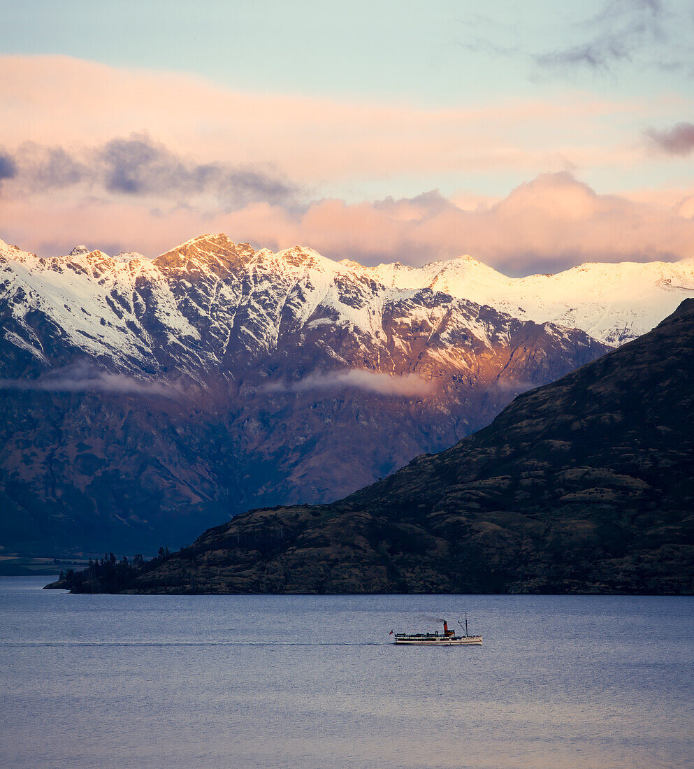 Snow capped Remarkables surrounding Lake Wakatipu and 