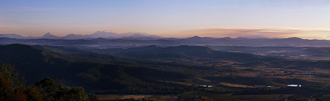 Panorama taken from Mount Tamborine looking down on Beaudesert rural landscape and mountain range in the background