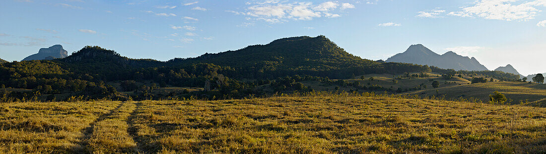 Panorama of hills and rural landscape with Mount Lindesay in the background