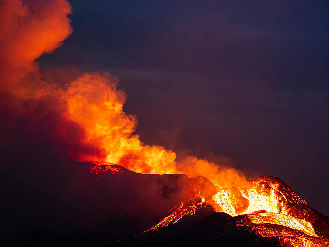 Glowing lava at twilight, Fagradalsfjall Volcano from Observation Hill, Iceland