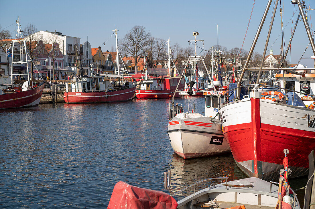 Fishing boats at the middle pier in Warnemünde in the morning.