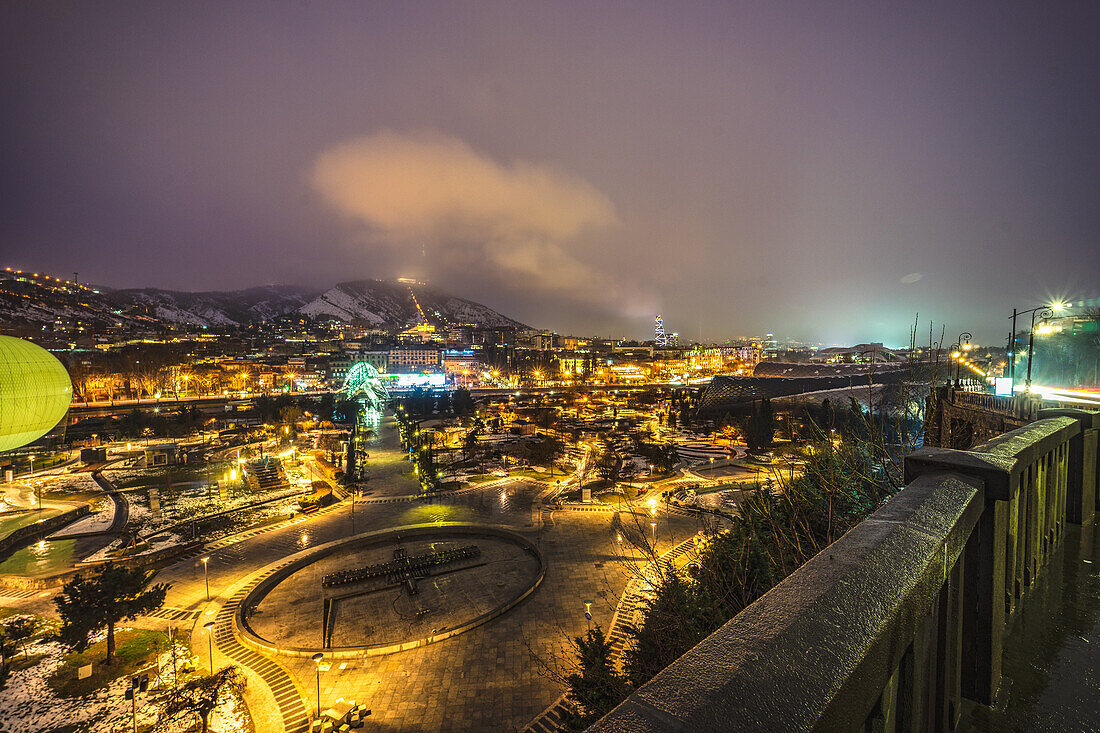 Evening view of Tbilisi's Old town with unusual heave snow