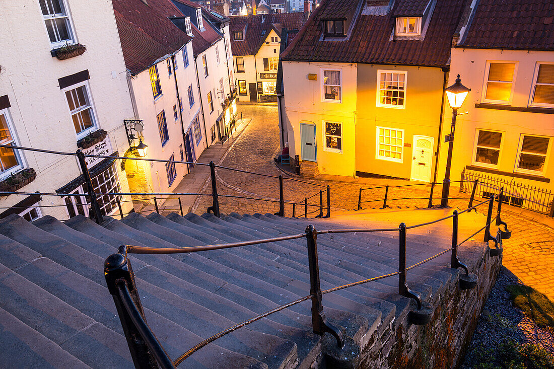 Old Staircase in Whitby, North Yorkshire, England. In the evening, illuminated. 199 steps.