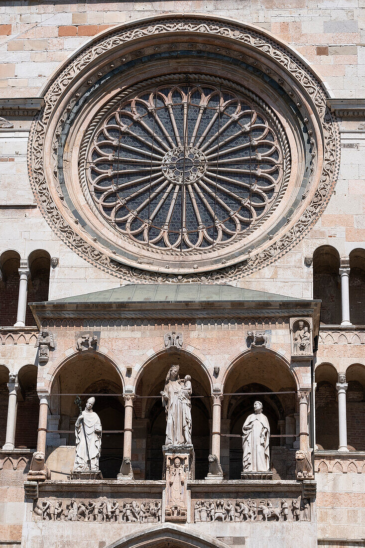 View of the portico and rose window on the main facade of Cremona Cathedral, Cremona, Lombardy, Italy, Europe