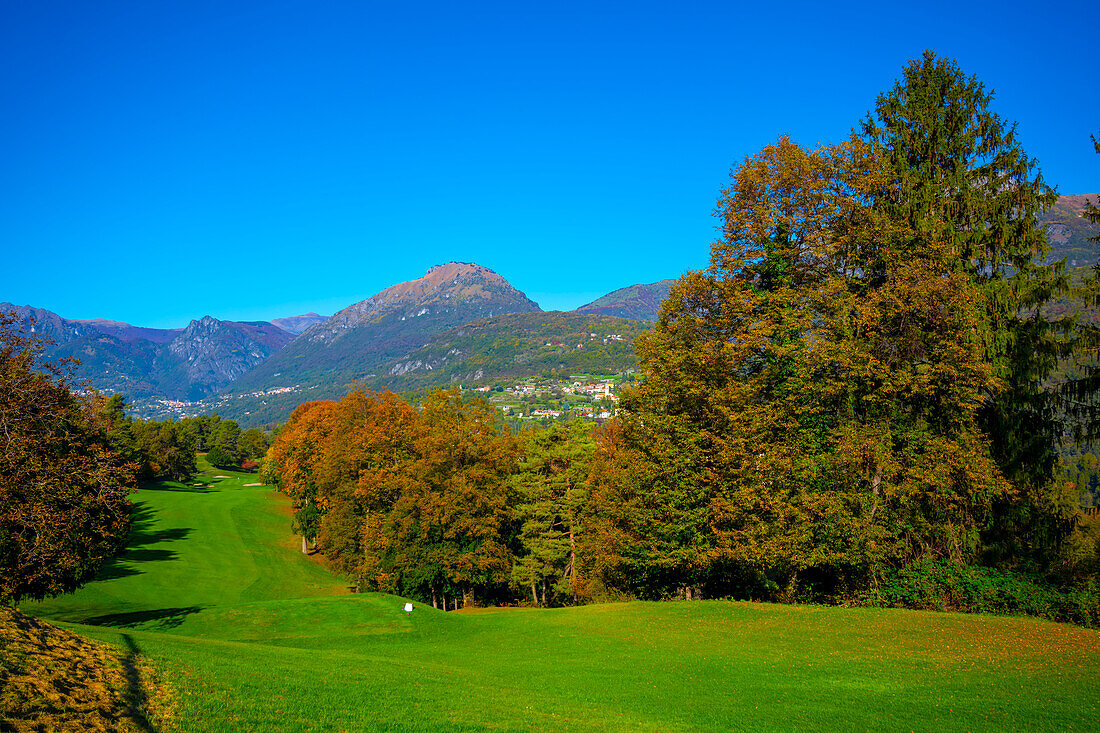 Hole 1 in Golf Course Menaggio with Mountain View in Autumn in Lombardy, Italy.