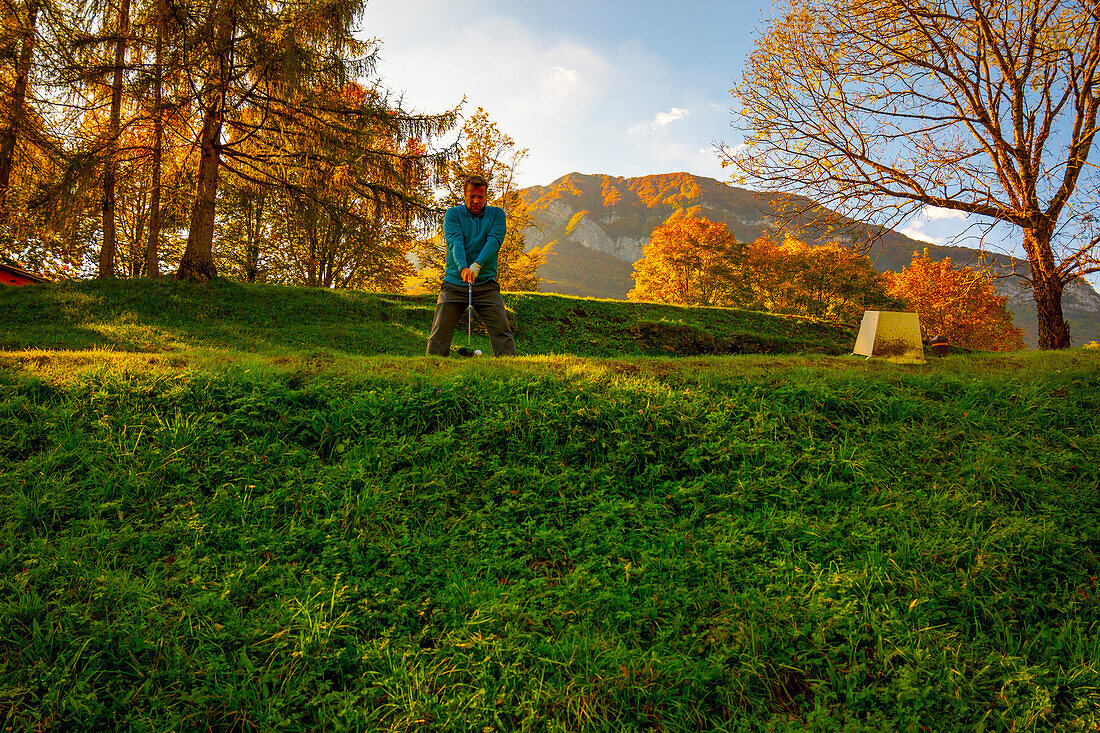 Hole 5 in Golf Course Menaggio with Mountain View in Autumn in Lombardy, Italy.