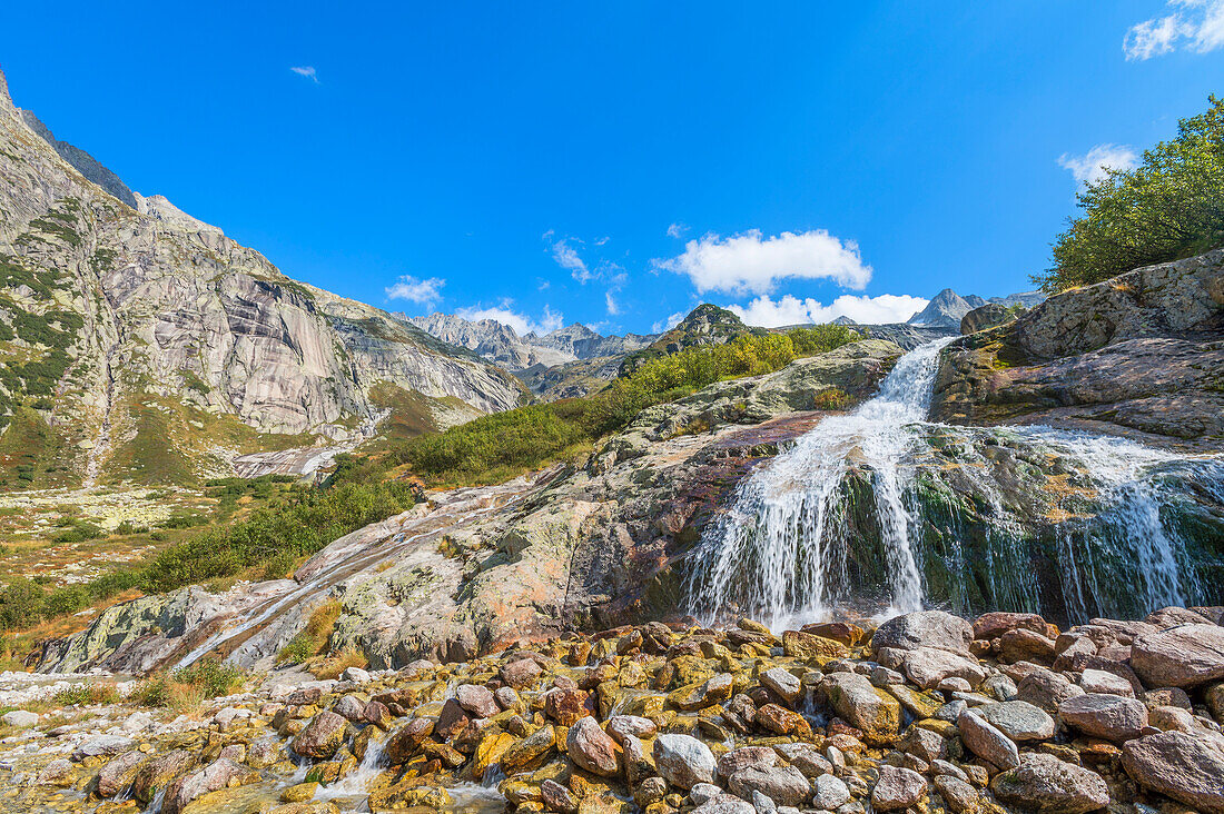 Waterfall at Gelmersee in the Uri Alps, Canton Bern, Switzerland