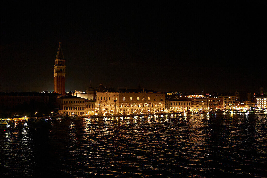Night time view from Venice Lagoon of St. Mark's Tower and Doge's Palace, Venice, Italy, Europe