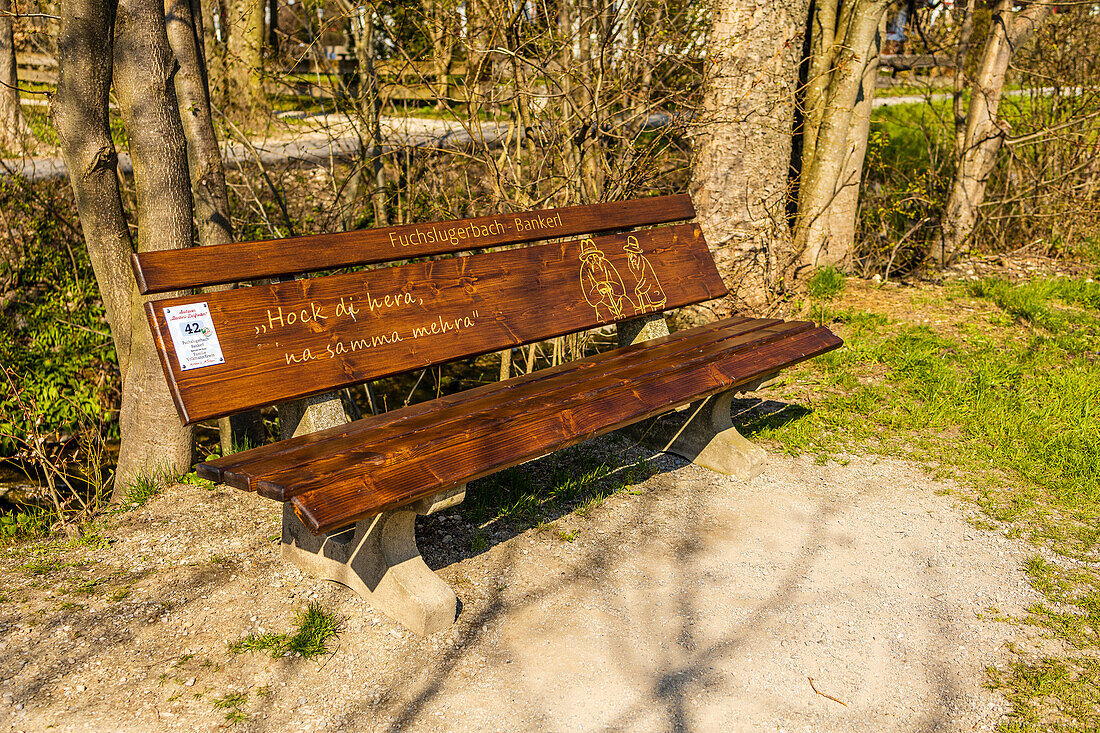 Fuchslugerbach Bankerl with Bavarian slogan. Hohenaschau, Chiemgau, Upper Bavaria, Bavaria, Germany