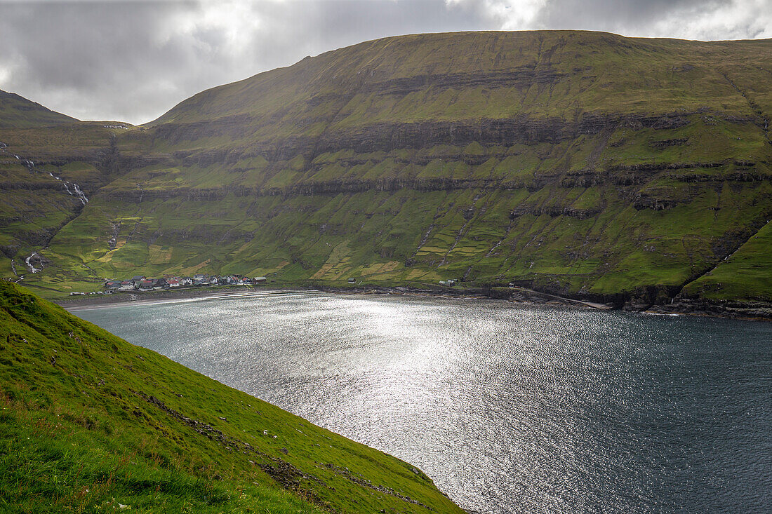View of fjord and village of Tjornuvik, Streymoy, Faroe Islands.